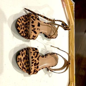 Cheetah print open toe women’s sandals.